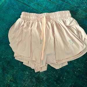 Light pink flowy athletic shorts